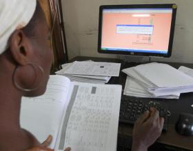 Abiola Olugbade, a family planning data input officer, works in the Measurement, Learning and Evaluation (MLE) office in the cen