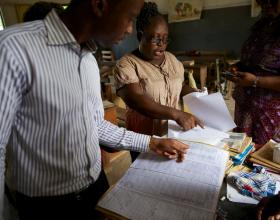 People reviewing documents