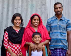 Milk collector Sabina with husband Vutto & two daughters, Maisha (left) and Manisha, in Nepaltoli, Bangladesh.