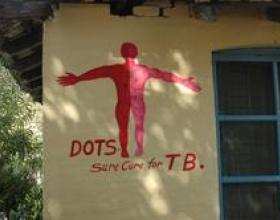 DOTS Sure cure fo TB painted on a wall