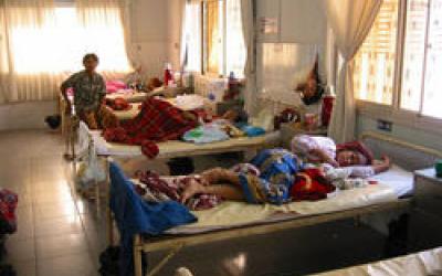 Room in a clinic with multiple patients Room in a clinic with multiple patients