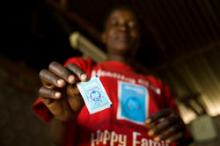 Woman showing a card